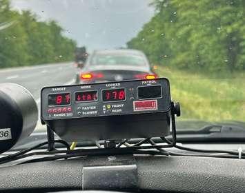 OPP take a photo of their radar enforcement equipment after stopping a stunt driver. Saturday, May 25, 2024. Image courtesy of OPP West Region on X (formerly Twitter).
