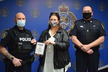 Sarnia Police Services Cst. Phil Veale receives the Safe Roads Champions award. March 2022. (Photo courtesy of MADD Sarnia/Lambton)