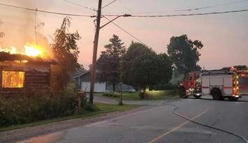 A fire at an abandoned building on Snye River Road on Walpole Island First Nation. July 30, 2025. (Photo courtesy of the Walpole Island Fire Department)