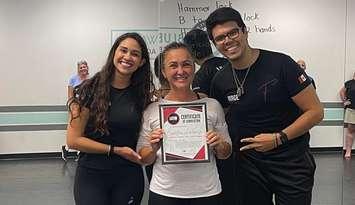 (From left to right) America Soto, Sandra Laranja and Jorge Pablos with Latin Fire Dance Company. Image courtesy of Latin Fire Dance Company Facebook.