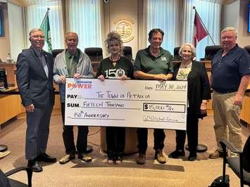 (L to R) Garry McDonald, Chair; Mayor R. Brad Loosley; Janice McMichael-Dennis, CEO; Rick Charlebois, CAO/Treasurer (Town of Petrolia); Margaret Dragan, CPA, CA, BSc, Vice Chair; Brad Goodhill, Minority Director for Bluewater Power. Photo submitted by the Town of Petrolia. 