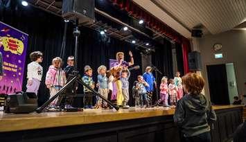 Children's entertainer, Dan the Music Man, performs on-stage at Sarnia Library Theatre for Family Literacy Day Festival 2024. (Photo courtesy of Lambton County Library)