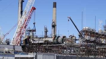 Large cranes at site of collapsed fuel processing tower at Sarnia Imperial refinery Apr. 24, 2019 (Blackburn photo by Colin Gowdy)