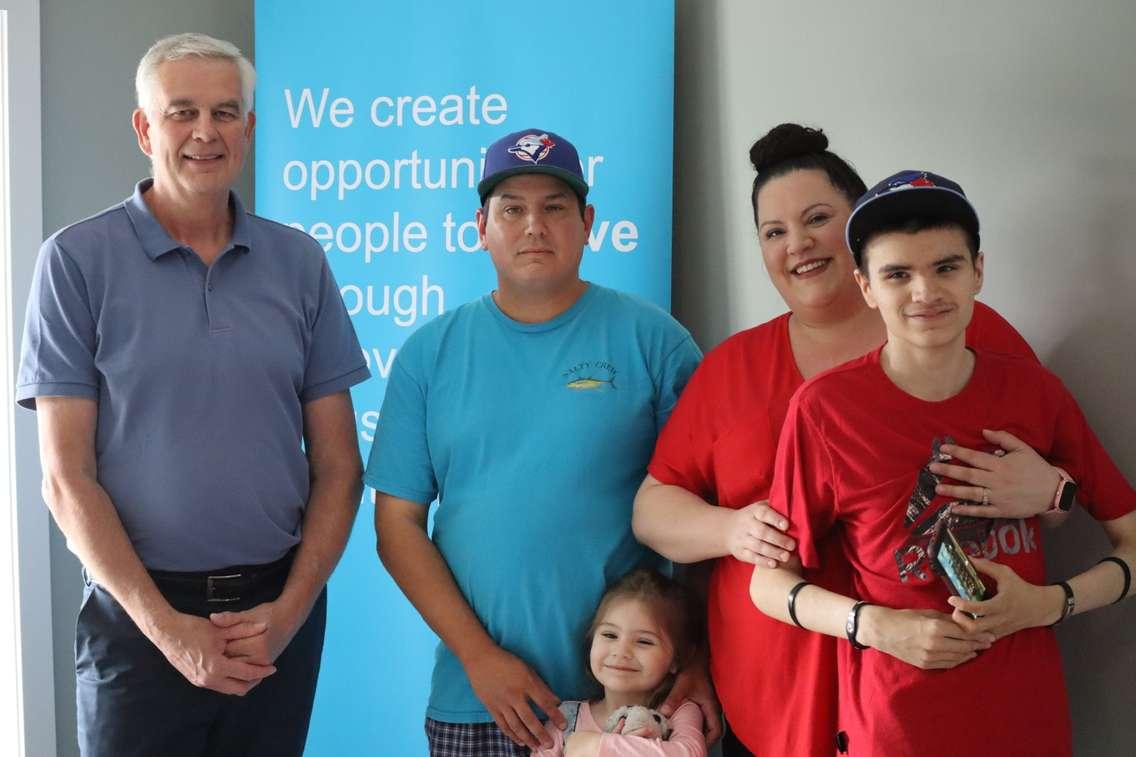 Pictured in the photo are Habitat for Humanity Grey Bruce Executive Director Greg Fryer (left), as well as Don, Angie, and their children. Photo from Habitat for Humanity Grey Bruce.