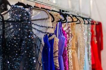 Prom dresses on a rack (Photo by Silk-stocking/iStock/Getty Images Plus via Getty Images)
