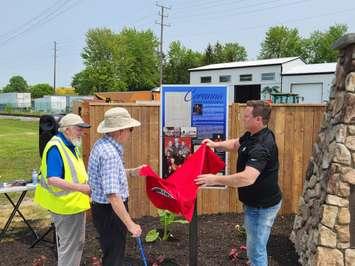 A storyboard is unveiled at St. George's Square in Corunna (Blackburn Media Photo by Josh Boyce)