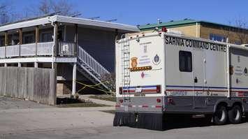 Sarnia Command Centre stationed outside of a residence on Queen Street, near Devine Street, for a homicide investigation. February 23, 2024. (Photo by Natalia Vega)  