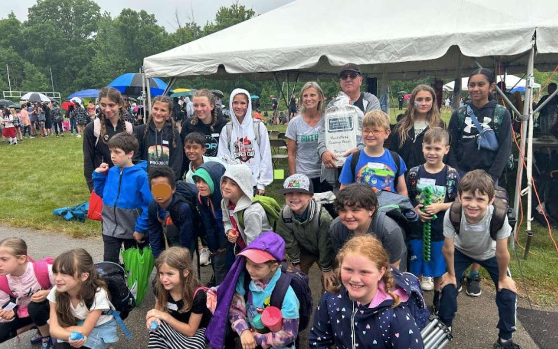 St. Anne Catholic School donating a water filtration system to Antler Elementary during a Pow Wow. 23 June 2023. (Photo by St. Clair Catholic School Board.