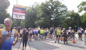 Granfondo Chairman Ken MacAlpine speaking to a crowd of cyclists at Blackwell Plaza. August 1, 2018. (Photo by Colin Gowdy, BlackburnNews)