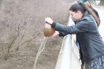 Oneida member Kaila Schuyler honouring water during World Water Day celebrations, March 22, 2023. Photo provided by Oneida Nation of the Thames. 