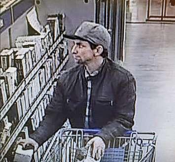 A surveillance image of a man wanted in relation to a robbery at the Strathroy Wal-Mart, January 6, 2019. Photo courtesy of Strathroy-Caradoc police.