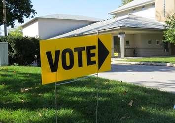 A sign outside of a polling station. (File photo by Miranda Chant, Blackburn News)