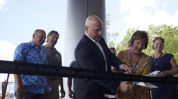 Gateway Casinos CEO Tony Santo and Point Edward Mayor Bev Hand cutting the ribbon at the grand opening of the new Match restaurant. July 5, 2018. (Photo by Colin Gowdy, BlackburnNews)