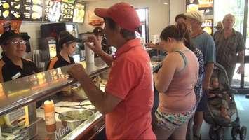 Crowd at Chatham Harvey's. Blackburn News file photo.