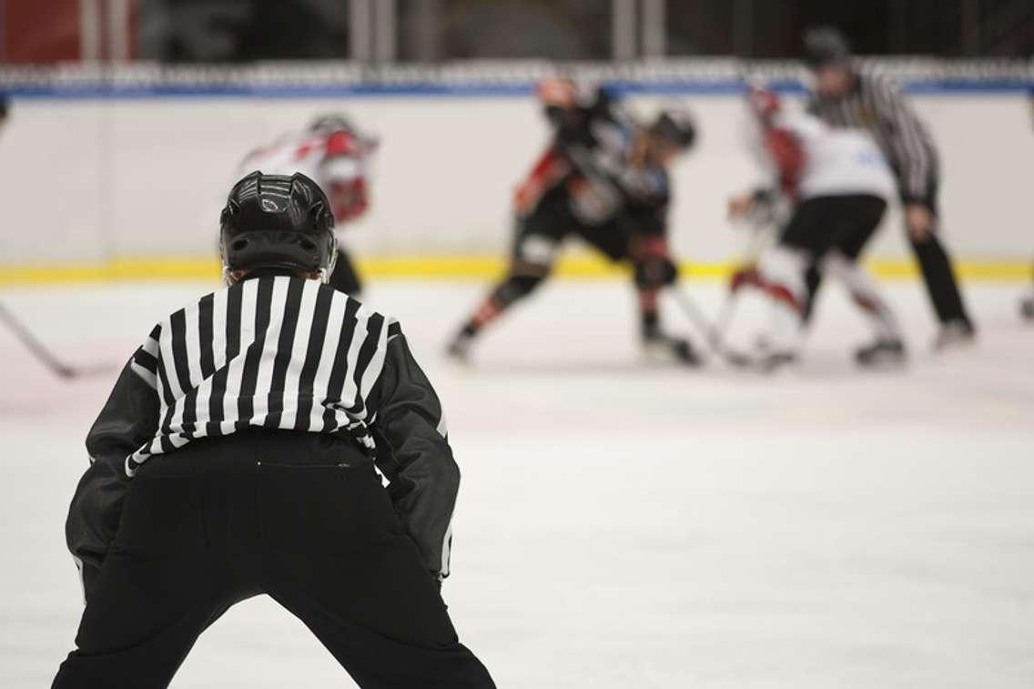 Ice hockey refree. Photo courtesy of © Can Stock Photo Inc. / Modestil