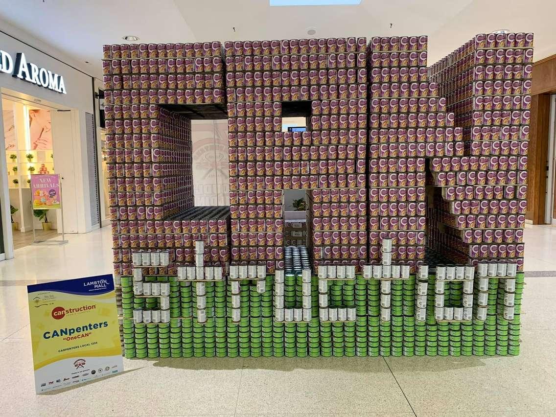 Carpenters Local 1256 CANstruction build. March 27, 2022. Photo courtesy of the Inn of the Good Shepherd via Facebook.