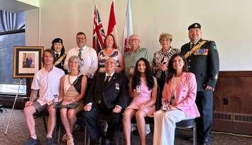 Recipients of the King Charles III Coronation Medals. First row (left to right): John Dawson Jr., Tracy Dawson (on behalf of John Dawson), MPP Bob Bailey, Raveena Duggal, Debb Pitel. Second row: Master of Ceremonies Hon. Col. Tania Lee, Nick Salaris, Judy Krall, Doug Krall, Marilyn Gifford,1st Hussars Regimental Sgt. Maj. Scott Elliott. July 14, 2025. (Photo courtesy of Bob Bailey's office)