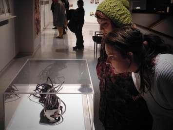Patrons at TAG's 2017 Ontario Juried Exhibition (Image courtesy of the Thames Art Gallery)