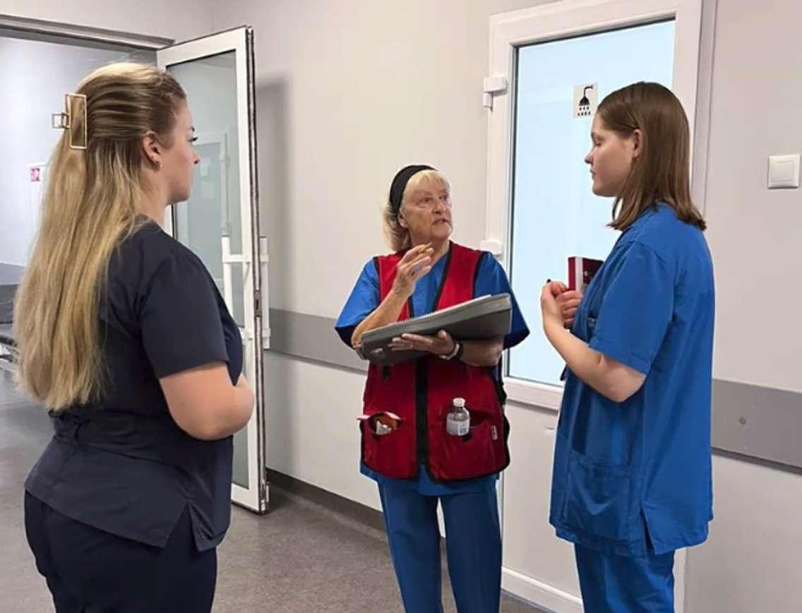 Bonnie Kearns interviews nurses in Ukraine, asking what they need from the Red Cross. Image courtesy of Bonnie Kearns.