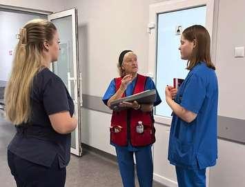 Bonnie Kearns interviews nurses in Ukraine, asking what they need from the Red Cross. Image courtesy of Bonnie Kearns.