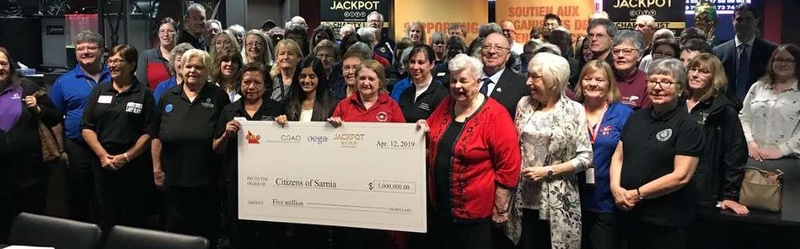 Volunteers from local charities celebrate a fundraising milestone at Sarnia's Jackpot City. April 12, 2019 Photo by Melanie Irwin