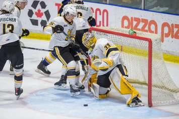 Lukas Fischer and Karsen Chartier in action against the Erie Otters (Photo courtesy of Metcalfe Photography)
