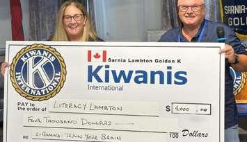 Literacy Lambton Executive Director Tracy Pound and Golden K charitable gaming coordinator Tony Wheeler. August 14, 2025. (Photo courtesy of the  Kiwanis Club of Sarnia-Lambton Golden K)