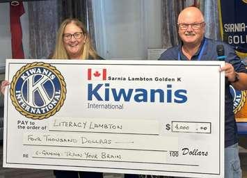 Literacy Lambton Executive Director Tracy Pound and Golden K charitable gaming coordinator Tony Wheeler. August 14, 2025. (Photo courtesy of the  Kiwanis Club of Sarnia-Lambton Golden K)