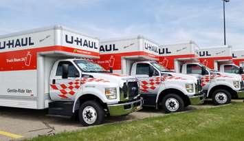 U-Haul trucks lined up. (Photo courtesy of U-Haul)