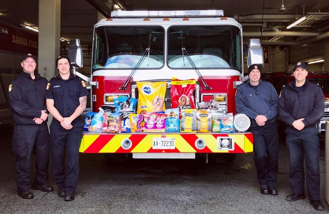 Sarnia Fire taking part in the Cause for Paws pet food drive in support of the Inn of the Good Shepherd. 4 March 2020. (Photo by Sarnia Fire)