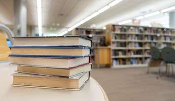 Books on a table at a library
