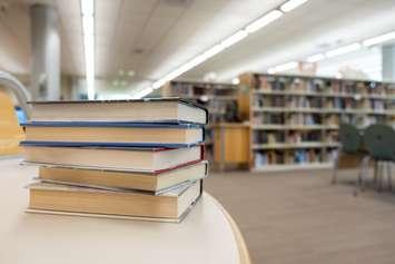 Books on a table at a library