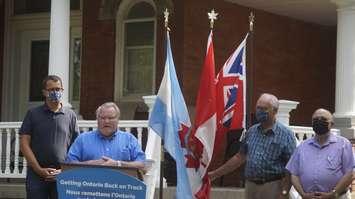 (From left to right) Monte McNaughton, Bill Weber, Randy Pettapiece and Bob Bailey at a provincial announcement in Watford.  14 August 2020. (BlackburnNews.com photo by Colin Gowdy)