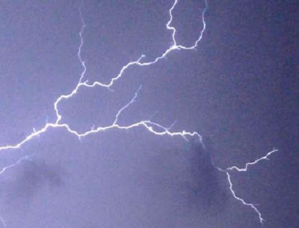 Saugeen Shores firefighters on-scene after lightning struck a Port
Elgin home on Monday evening. Photo by Jordan MacKinnon.