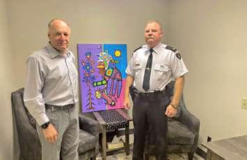Murray Jackson, Board LGPSB Chair (left) and Inspector Chris Avery, Lambton OPP Detachment Commander (right) in the newly renovated OPP interview room in Petrolia. Photo supplied by the Lambton Group Police Services Board.