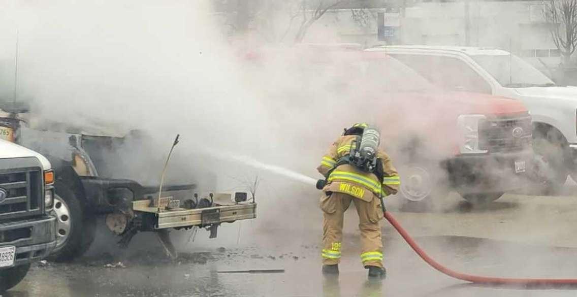 Sarnia firefighters extinguish a vehicle fire on Confederation Street - Dec 29/23 (Photo courtesy of Sarnia Fire and Rescue)