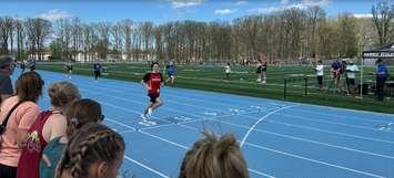 Lambton Kent Composite School Grade 9 student Kinser Rivest wins the 200 metre race at the Secondary Track and Field Pre-Meet at Great Lakes Secondary School. April 30, 2024 Blackburn Media photo by Melanie Irwin