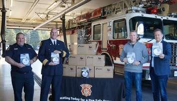 Deputy Chief Ken Dwinnell, Fire Chief Jeff Weber, Enbridge Gas Sarnia Operations Supervisor Robin Ellwood, and Fire Marshal’s Public Fire Safety Council Executive Director Jamie Kovacs. October 17, 2024. (Photo by Natalia Vega)