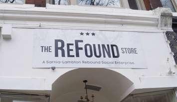 The ReFound Store sign. The three stars represent the three founders of Sarnia-Lambton Rebound. May 5, 2023. (Photo by Natalia Vega)