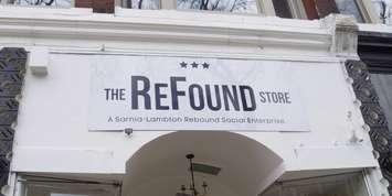 The ReFound Store sign. The three stars represent the three founders of Sarnia-Lambton Rebound. May 5, 2023. (Photo by Natalia Vega)