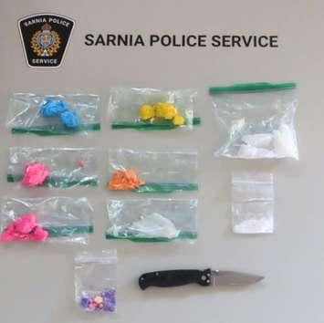 Drugs and a folding knife seized by Sarnia police - July 3/24 (Photo courtesy of Sarnia Police Service)