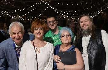 (L to R) John DeGroot, Theatre Sarnia actors Andrea Coleman, Trevor Moores, Elizabeth Walton and Michael Hillier at Rotary’s 2024 Mystery Dinner. Photo by Michael John Kooy.