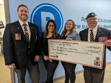 Legion President Ron Realesmith, Rebound President Meghan Realesmith, Hub Supervisor Kristen Clendenning, and Community Services Officer Bruce Browning. February 23, 2024 (Image courtesy of Sarnia Legion Branch 62 via. Facebook.)