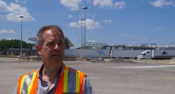 Federal Bridge Corporation Limited Director of Communications Todd Kealey with Blue Water Bridge in the backgroud. June 11. 2019. (BlackburnNews photo by Colin Gowdy)