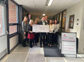 The House of Sophrosyne receives donation from the Motor City Community Credit Union, November 7, 2023. (Photo by Maureen Revait) 