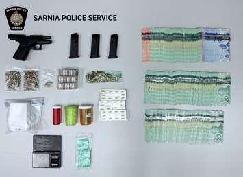 Items seized from a 'trap house' on Tecumseh Street in Sarnia - Aug 25/25 (Photo courtesy of Sarnia Police Service) 