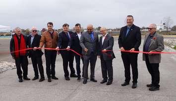 Cestar’s Chief Operating Officer Adrian Sharma is joined by local officials to snip the ribbon celebrating the completion of the Cestar Dock at Sarnia Harbour. October 31, 2024 Blackburn Media photo by Melanie Irwin.