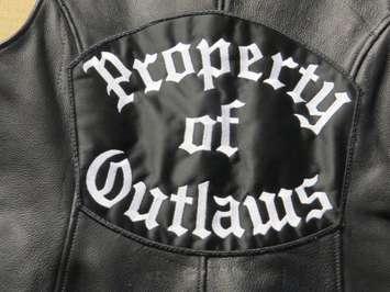 Outlaws Motorcycle Club patch seized by police (Photo by Tamara Thornton, Blackburn Media)