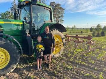 Kevin Rombouts (Max’s dad) and big brother Zac in the Minion patch (Photo courtesy of Brian Schoonjans)