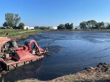 Shire Corporation cleaning out the lagoons in Sarnia. Photo courtesy of Shire Corp via Facebook. 